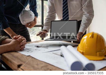 engineer team working in office with blueprints, inspection in workplace for architectural plan, construction project ,Business construction 105017335