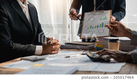 Business Consulting meeting working and brainstorming analyzing new business project finance investment concept Business Consulting meeting working and brainstorming analyzing new business project finance investment concept 105017464