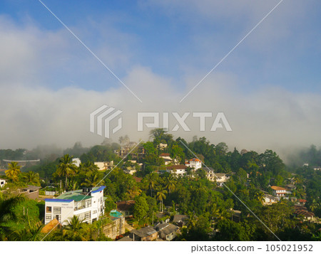 A white hotel in the mountains of a tropical country (Landscape of Kandy, Sri Lanka) 105021952