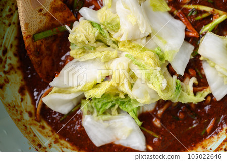 Korean food, Kimchi cabbage cooking in bowl, Homemade fermented side dish 105022646