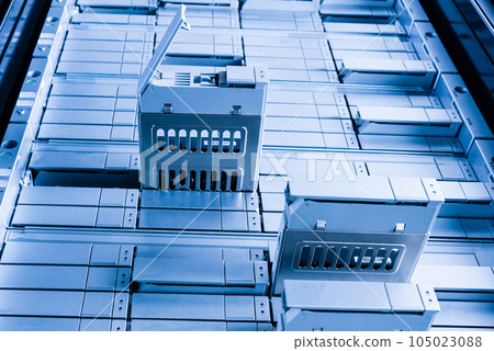 detail of data center with some of hard drive bays open 105023088