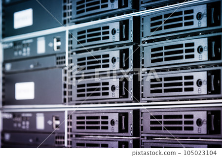 Row of hard disks used for data storage in internet data center 105023104