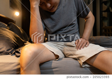 Middle aged man suffering from Benign Prostatic Hyperplasia,stress urinary incontinence,wet his pants,lack of voluntary control over urination,urinary frequency,urgency incontinence,health problems 105023393