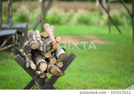 Pile of firewood in campsite, tourism, recreation outside, camping and travel concept 105025612