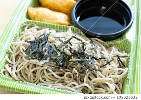 A set of cold soba noodles and inari sushi, a summer tradition 105025632
