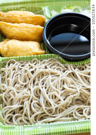 A set of cold soba noodles and inari sushi, a summer tradition A set of cold soba noodles and inari sushi, a summer tradition 105025634