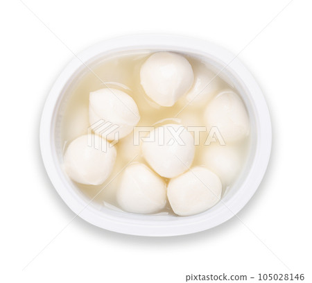 Small mozzarella balls with brine, in a plastic cup. Fresh white southern Italian cheese made from milk by the pasta filata method. Bambini bocconcini, used for pizza, pasta dishes or Caprese salad. 105028146