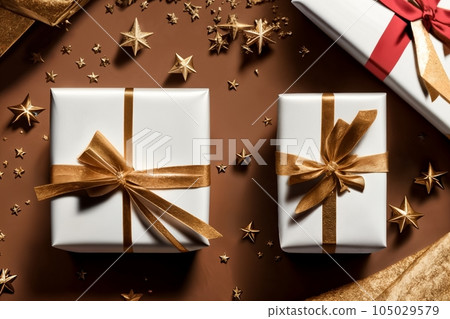 Gift or present box and flower gypsophila on table top view. Greeting card. Flat lay style with copy 105029579