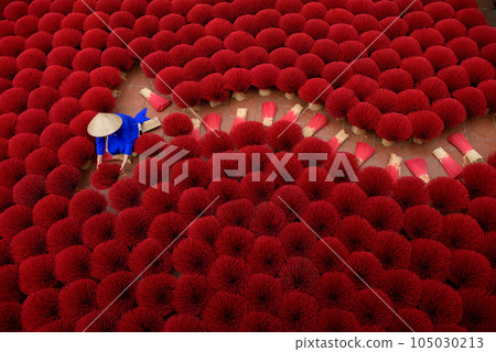 Asian woman in a traditional ao dai dress Asian woman in a traditional ao dai dress 105030213