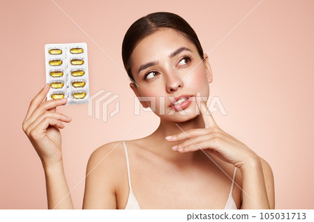 Beautiful Girl With Pill With Cod Liver Oil Omega-3 105031713