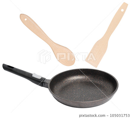 Empty black round metal plate with non-stick coating isolated on white background Empty black round metal plate with non-stick coating isolated on white background 105031753