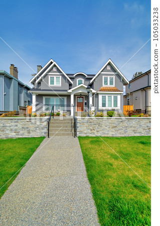 Luxury residential houses with landscaped front yard on land terrace 105033238