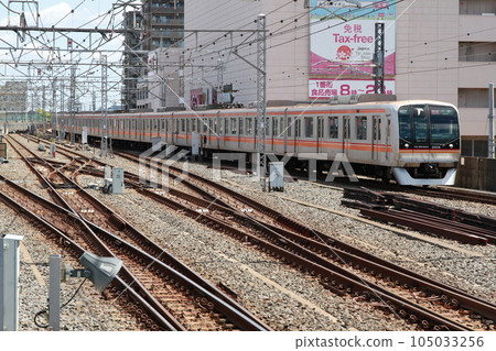 Toyo Rapid Railway Series 2000 train entering Myoden Station Toyo Rapid Railway Series 2000 train entering Myoden Station 105033256