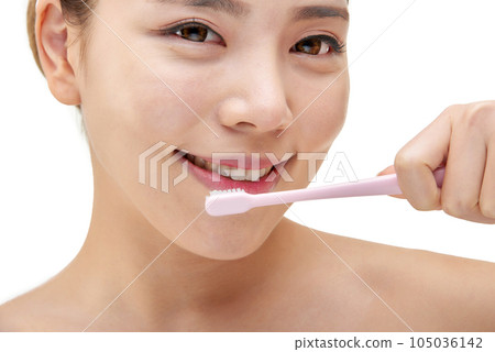 beautiful woman with toothbrush beautiful woman with toothbrush 105036142