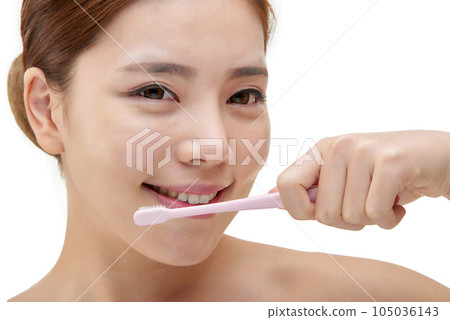 beautiful woman with toothbrush 105036143