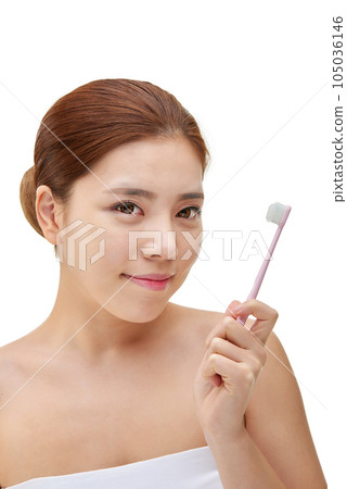 beautiful woman with toothbrush 105036146