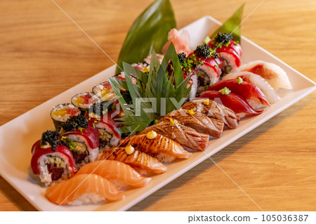 Sushi set on a white plate Sushi set on a white plate 105036387