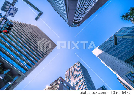 Tokyo cityscape in Japan Looking at office buildings from the Kyobashi intersection (redevelopment...) 105036482