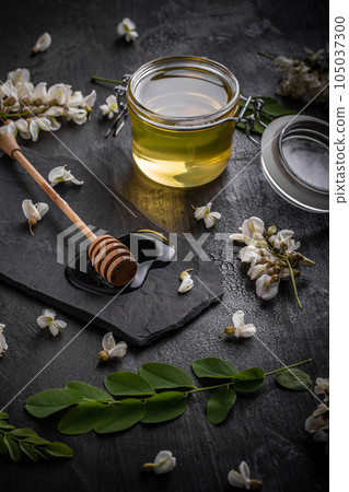 Acacia flowers and natural honey 105037300