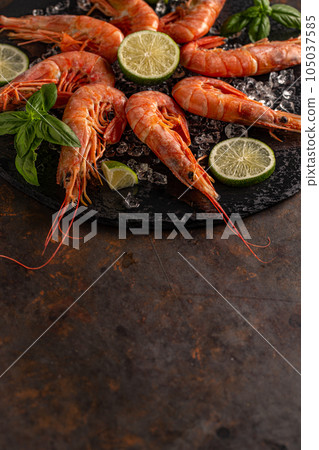 Delicious raw fresh red king shrimps Delicious raw fresh red king shrimps 105037585