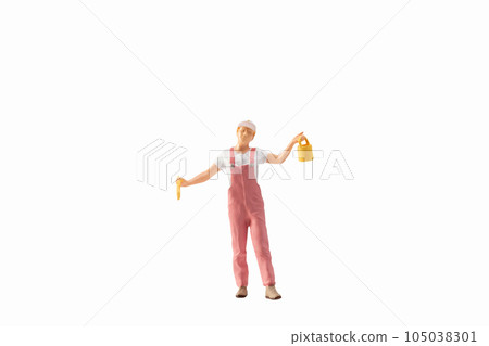Miniature people, painter holding paint brush on white background with clipping path 105038301