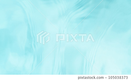Freeze motion of splashing water surface on light blue background Freeze motion of splashing water surface on light blue background 105038373
