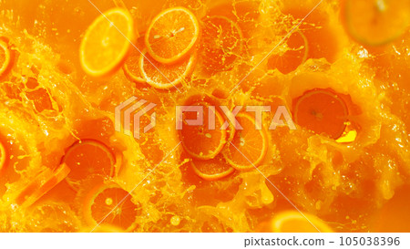 Freeze motion of mixing orange juice in twister shape. Filmed on high speed cinema camera, 1000 fps. Freeze motion of mixing orange juice in twister shape. Filmed on high speed cinema camera, 1000 fps. 105038396