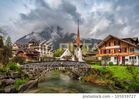 Kandersteg Switzerland, city skyline at Kander River and Evangelical church 105039727