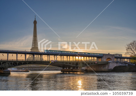 Paris France, sunrise city skyline at Eiffel Tower and Seine River Bir-Hakeim Bridge Paris France, sunrise city skyline at Eiffel Tower and Seine River Bir-Hakeim Bridge 105039739