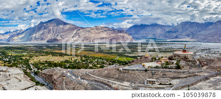 Panorama of Nubra valley in Himalayas with giant Buddha statue in Diskit, Ladakh, India 105039878