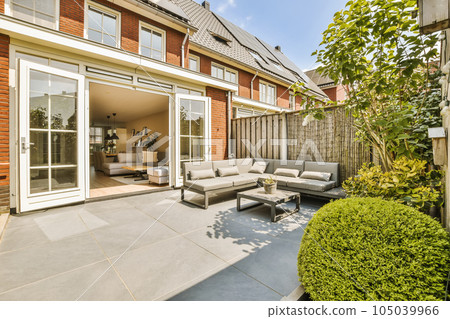 an outdoor living area with patio furniture and trees in the foreground photo taken on july 26, 2014 by david murphy an outdoor living area with patio furniture and trees in the foreground photo taken on july 26, 2014 by david murphy 105039966