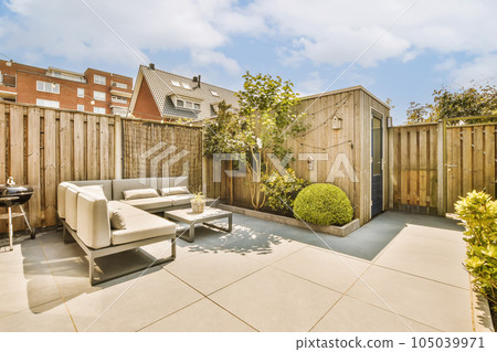 a backyard area with furniture and trees in the back yard on a sunny day, taken from an overhead view a backyard area with furniture and trees in the back yard on a sunny day, taken from an overhead view 105039971