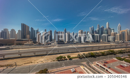 Dubai marina tallest block of skyscrapers all day timelapse. Dubai marina tallest block of skyscrapers all day timelapse. 105040346