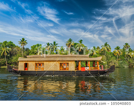 Travel tourism Kerala background - houseboat on Kerala backwaters. Kerala, India 105040803