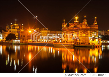 Sikh sacred site gurdwara Sri Harmandir Sahib also known as The Golden Temple also Darbar Sahib illuminated at night. Amritsar, Punjab state, India Sikh sacred site gurdwara Sri Harmandir Sahib also known as The Golden Temple also Darbar Sahib illuminated at night. Amritsar, Punjab state, India 105040846