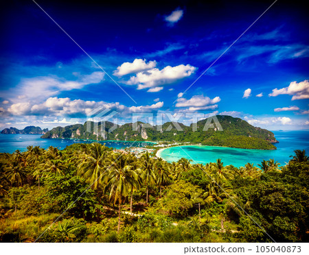 Vintage retro hipster style travel image of Travel vacation background - Tropical island with resorts - Phi-Phi island, Krabi Province, Thailand Vintage retro hipster style travel image of Travel vacation background - Tropical island with resorts - Phi-Phi island, Krabi Province, Thailand 105040873