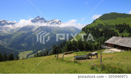 Idyllic mountain landscape near Gstaad, Switzerland. Idyllic mountain landscape near Gstaad, Switzerland. 105040971