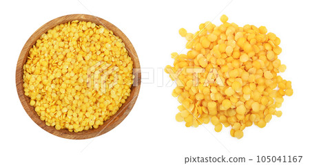 yellow lentil in wooden bowl isolated on white background. Top view 105041167