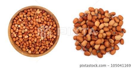 Dry raw organic chickpeas in wooden bowl isolated on white background. Top view Dry raw organic chickpeas in wooden bowl isolated on white background. Top view 105041169