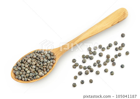 raw french green lentils in wooden spoon isolated on white background. Top view. Flat lay 105041187