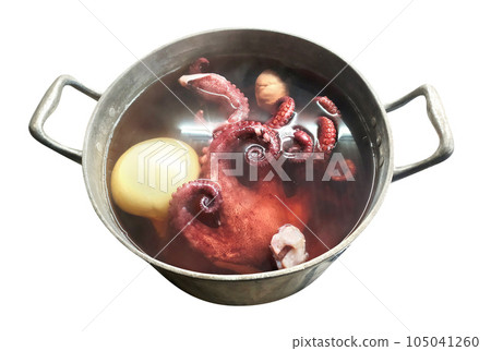 Classic cooking octopus in the village. Boiling and frying clam tentacles. Sea food. 105041260