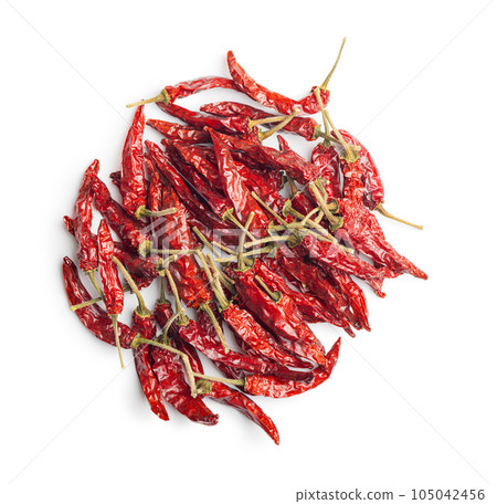 Red chili peppers isolated on white background. Red chili peppers isolated on white background. 105042456