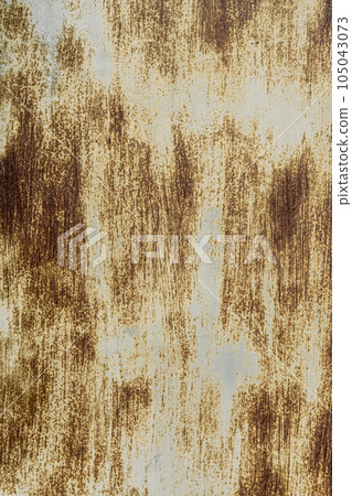 The background of an old iron sheet painted with rust spots The background of an old iron sheet painted with rust spots 105043073