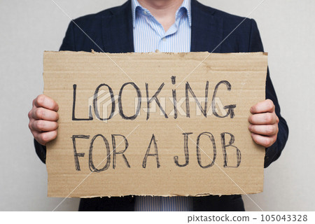 A young businessman who lost his job due to quarantine is looking for a job. A young businessman who lost his job due to quarantine is looking for a job. 105043328