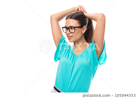 30 year old beautiful brunette woman with flowing straight hair wears glasses for vision correction 30 year old beautiful brunette woman with flowing straight hair wears glasses for vision correction 105044353