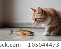 Cat aiming for fish 105044473