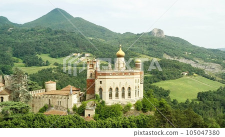 Aerial drone panoramic view of the Rocchetta Mattei castle in Italy on sunny summer day, view from above. High quality footage Aerial drone panoramic view of the Rocchetta Mattei castle in Italy on sunny summer day, view from above. High quality footage 105047380