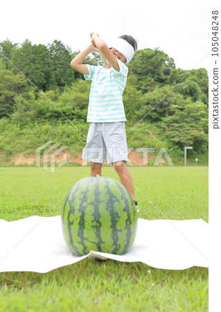 Children who spare watermelons Children who spare watermelons 105048248