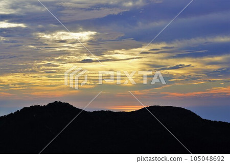 The sun setting over the Sea of Japan from the Mt. Kinpoku Trail The sun setting over the Sea of Japan from the Mt. Kinpoku Trail 105048692