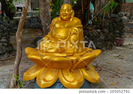 Golden Buddha on a lotus flower. Golden Buddha on a lotus flower. 105052791